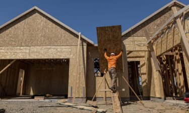 A contractor works on a house under construction at the Toll Brothers Regency at Folsom Ranch community in Folsom