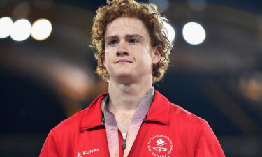 Shawn Barber looks on during the men's pole vault medal ceremony at the Gold Coast 2018 Commonwealth Games at Carrara Stadium in Australia on April 12