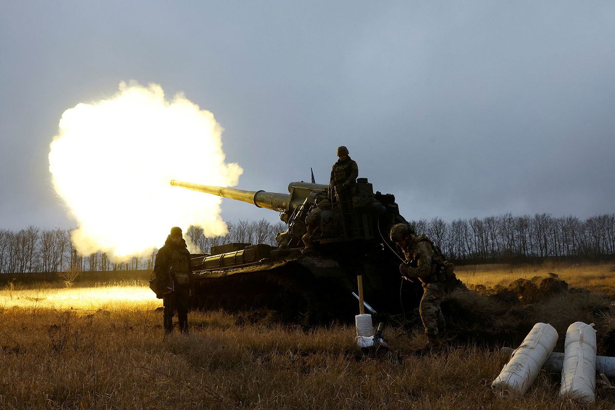 <i>Clodagh Kilcoyne/Reuters/File</i><br/>Ukrainian soldiers fighting Russia fire a projectile during intense shelling on the front line in Bakhmut