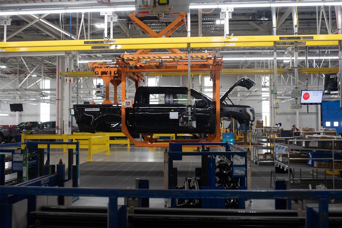 <i>Emily Elconin/Bloomberg/Getty Images</i><br/>A Ford F-150 Lightning on a production line of the Ford Motor Co. Rouge Electric Vehicle Center (REVC) in Dearborn