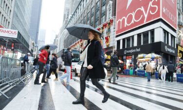 People cross the street outside Macy's Herald Square store in December 2023. Macy’s has rejected a $5.8 billion offer to take the 165-year-old retailer private.