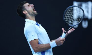Novak Djokovic is into the Australian Open semifinals after a four-set victory against Taylor Fritz.