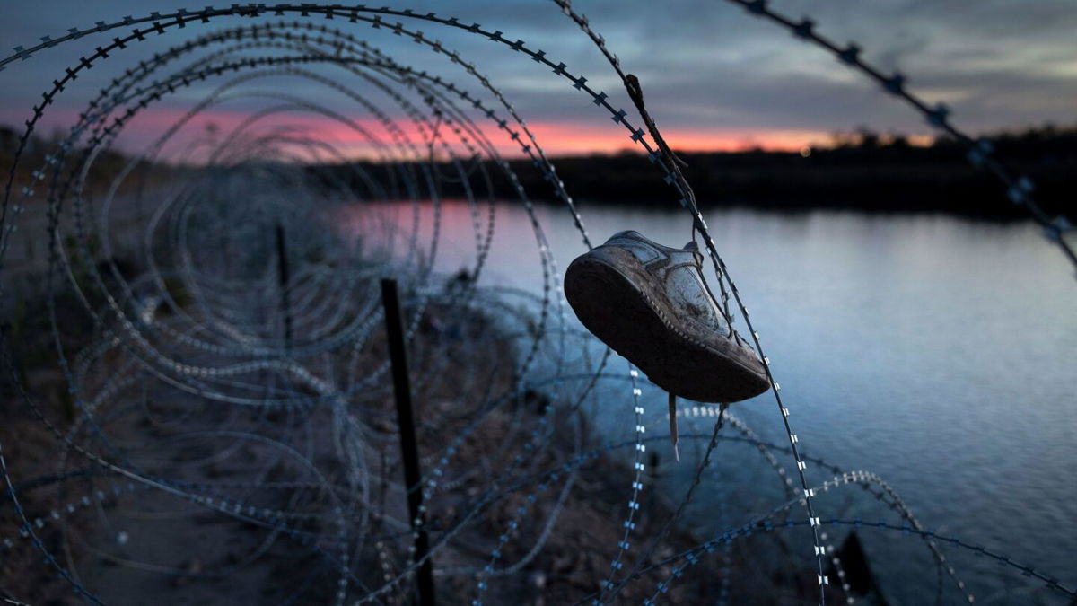 <i>Brandon Bell/Getty Images</i><br/>National Guard soldiers stand guard January 12 on the banks of the Rio Grande at Shelby Park in Eagle Pass