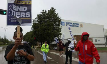 United Auto Workers union members strike at a General Motors assembly plant in Arlington