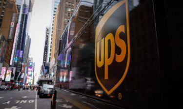 A UPS truck is parked on a street in Midtown Manhattan on August 07