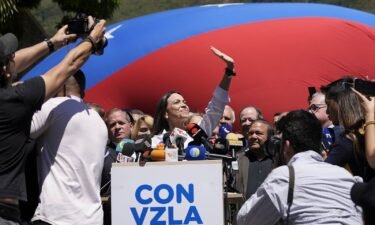 Opposition coalition presidential hopeful Maria Corina Machado gives a press conference outside her campaign headquarters in Caracas