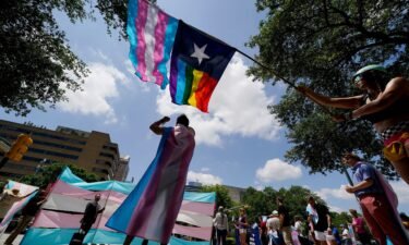 Demonstrators gathered on the steps to the Texas Capitol to speak against transgender-related legislation debated in the Texas Senate and House on May 20