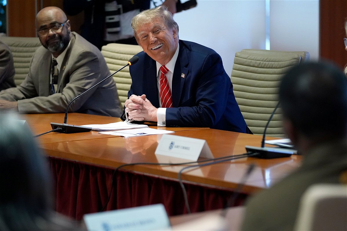 <i>Andrew Harnik/AP</i><br/>Former President Donald Trump meets with Teamsters members at the union's headquarters in Washington