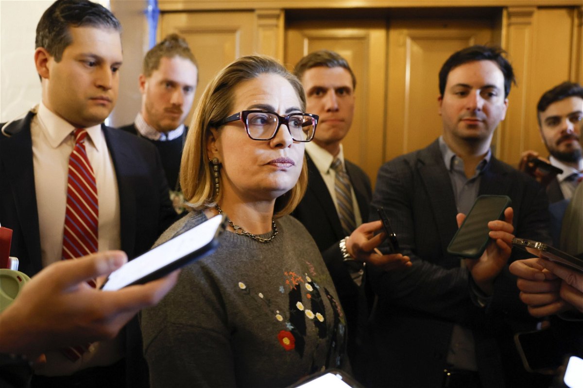 <i>Anna Moneymaker/Getty Images</i><br/>Kyrsten Sinema dismisses Senate reelection questions amid slowed fundraising and seen here speaks to reporters during a vote in the Senate Chambers on January 25.