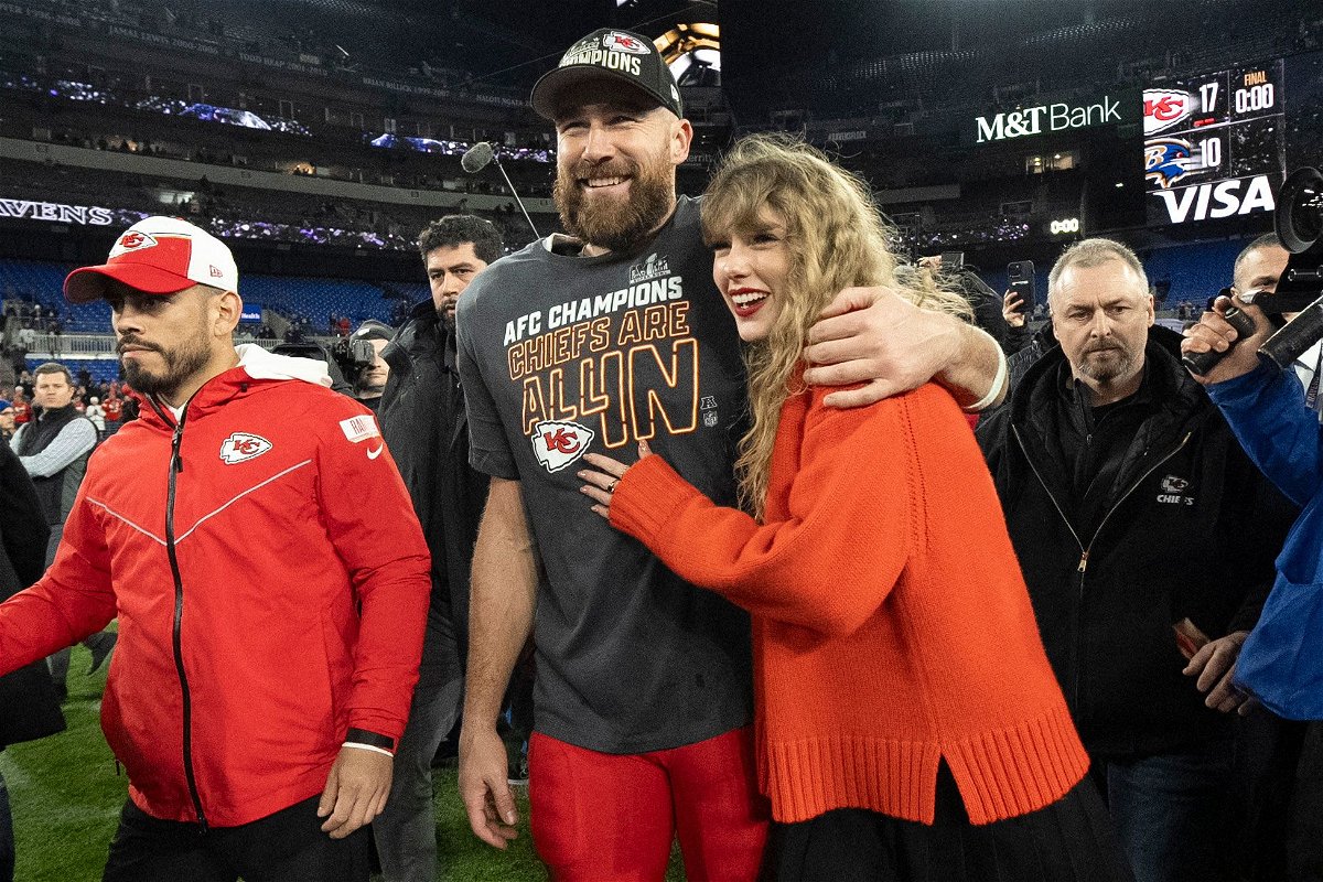 <i>Julio Cortez/AP</i><br/>(From left) Travis Kelce and Taylor Swift at the AFC Championship NFL football game in Baltimore on January 28.