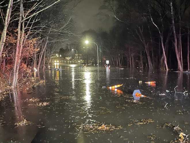 <i>Norwood Fire/WCVB</i><br/>A driver who didn't know how to swim was rescued after he clung to a tree when his car became submerged in water Wednesday on a flooded road in Norwood