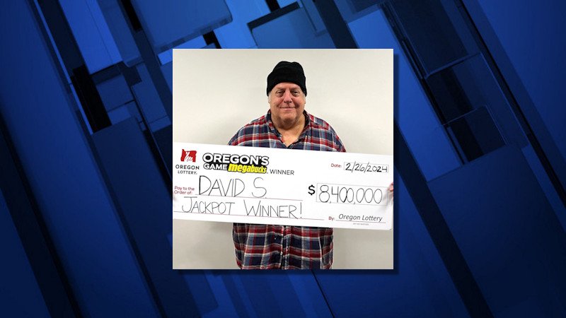 David Schultze of Milwaukie claimed his $8.4 million jackpot Megabucks prize on Monday.