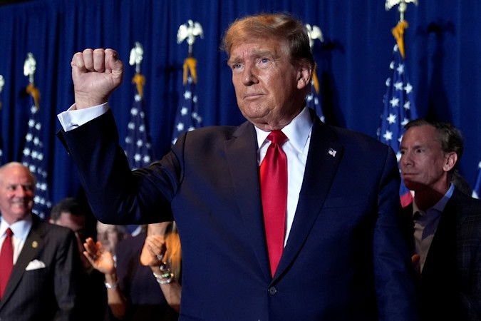 Republican presidential candidate former President Donald Trump reacts at a primary election night party at the South Carolina State Fairgrounds in Columbia, S.C., on Saturday 