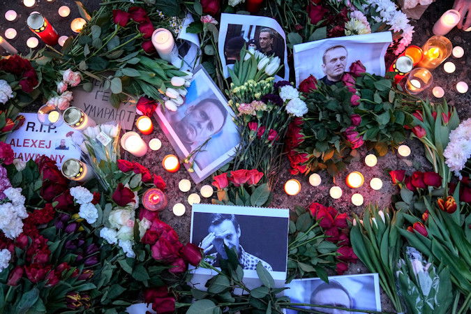 The body of Russian opposition figure Alexey Navalny has been given to his mother more than a week after he died, Navalny’s spokesperson Kira Yarmysh said on Saturday. Portraits of Navalny, flowers and candles are pictured in front of the Russian embassy in Berlin on Friday.