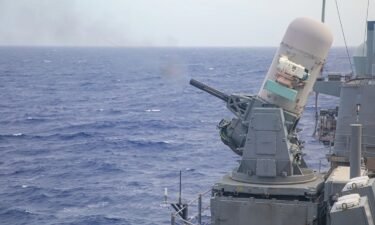 The guided-missile cruiser USS Antietam fires a Phalanx Close-In Weapon System (CIWS) during a live-fire exercise