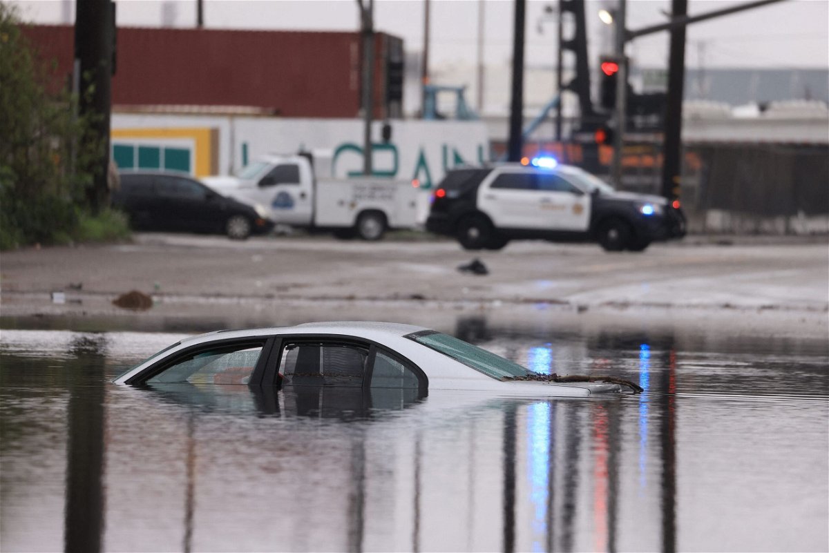 <i>David Swanson/AFP/Getty Images</i><br/>A section of the Pacific Coastal Highway closed Thursday from flooding during a rain storm in Bolsa Chica