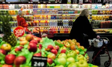 People shop in a supermarket in the Manhattan borough of New York city on January 27