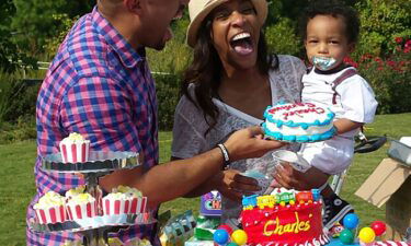 Kira and Charles Johnson celebrating their eldest son's first birthday.