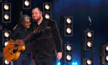 (From left) Tracy Chapman and Luke Combs embrace after performing during the 2024 Grammy Awards in Los Angeles.