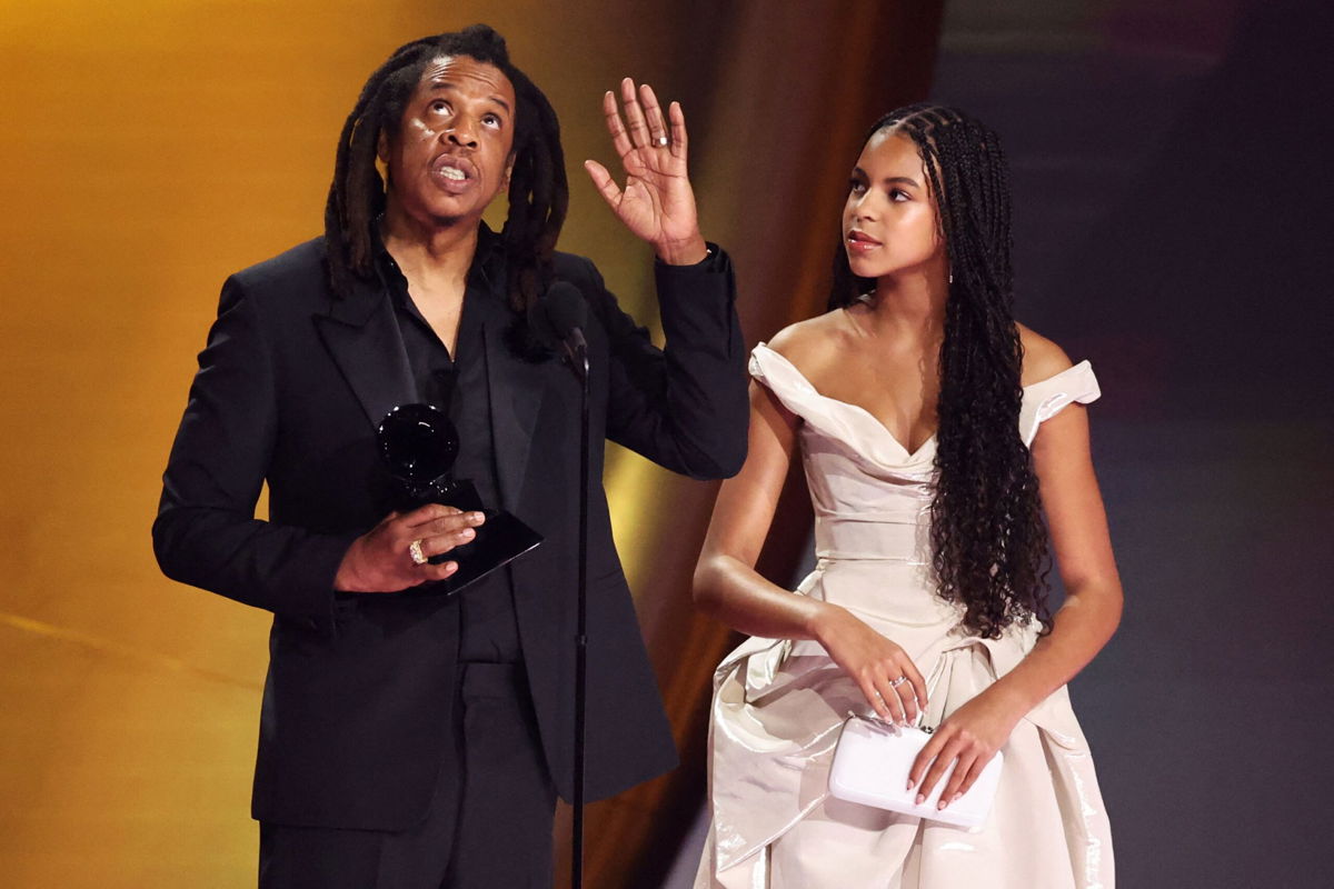 <i>Mike Blake/Reuters</i><br/>Jay Z accepts the Dr. Dre Global Impact Award as his daughter Blue Ivy Carter looks on during the 66th Annual Grammy Awards.