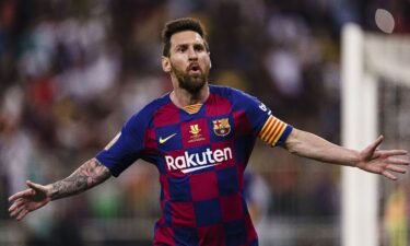 Lionel Messi celebrates his goal for Barcelona against Atlético Madrid during the Supercopa de Espana semifinal on January 9