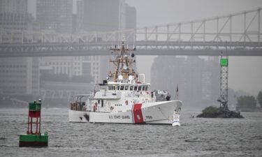 A US Coast Guard ship sits near the United Nations headquarters in New York City on September 18