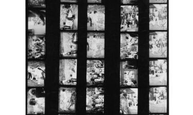 A contact sheet shows photographs taken at the Stones' legendary free concert in Hyde Park