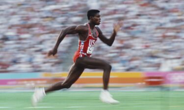 Lewis competes in the long jump at the 1984 Olympic Games in Los Angeles.