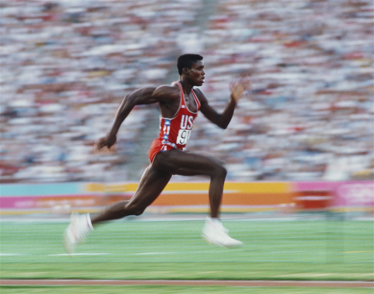 <i>David Cannon/Getty Images</i><br/>Lewis competes in the long jump at the 1984 Olympic Games in Los Angeles.