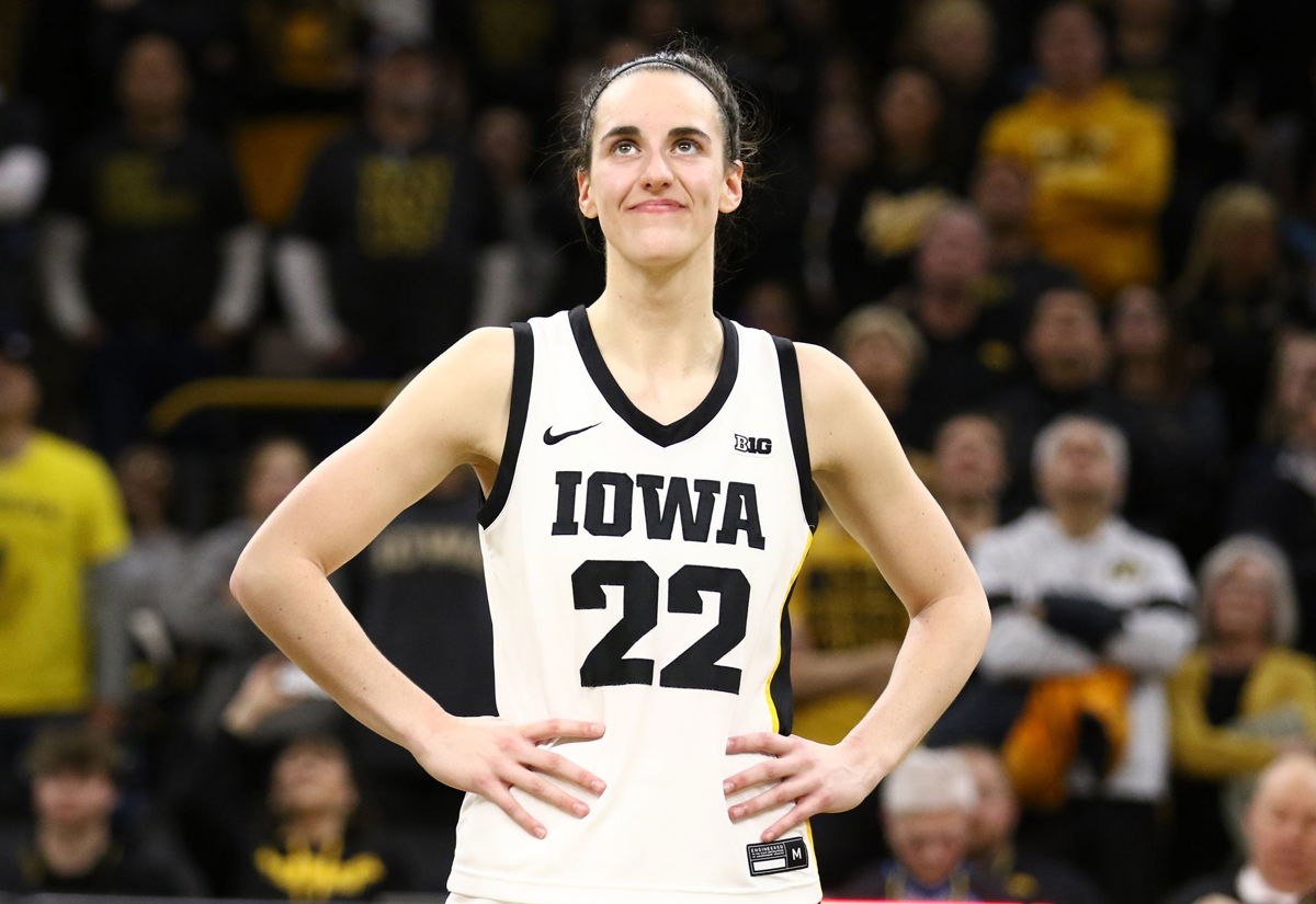 <i>Matthew Holst/Getty Images via CNN Newsource</i><br/>Caitlin Clark of the Iowa Hawkeyes listens as the crowd cheers after breaking the NCAA women's all-time scoring game last week.