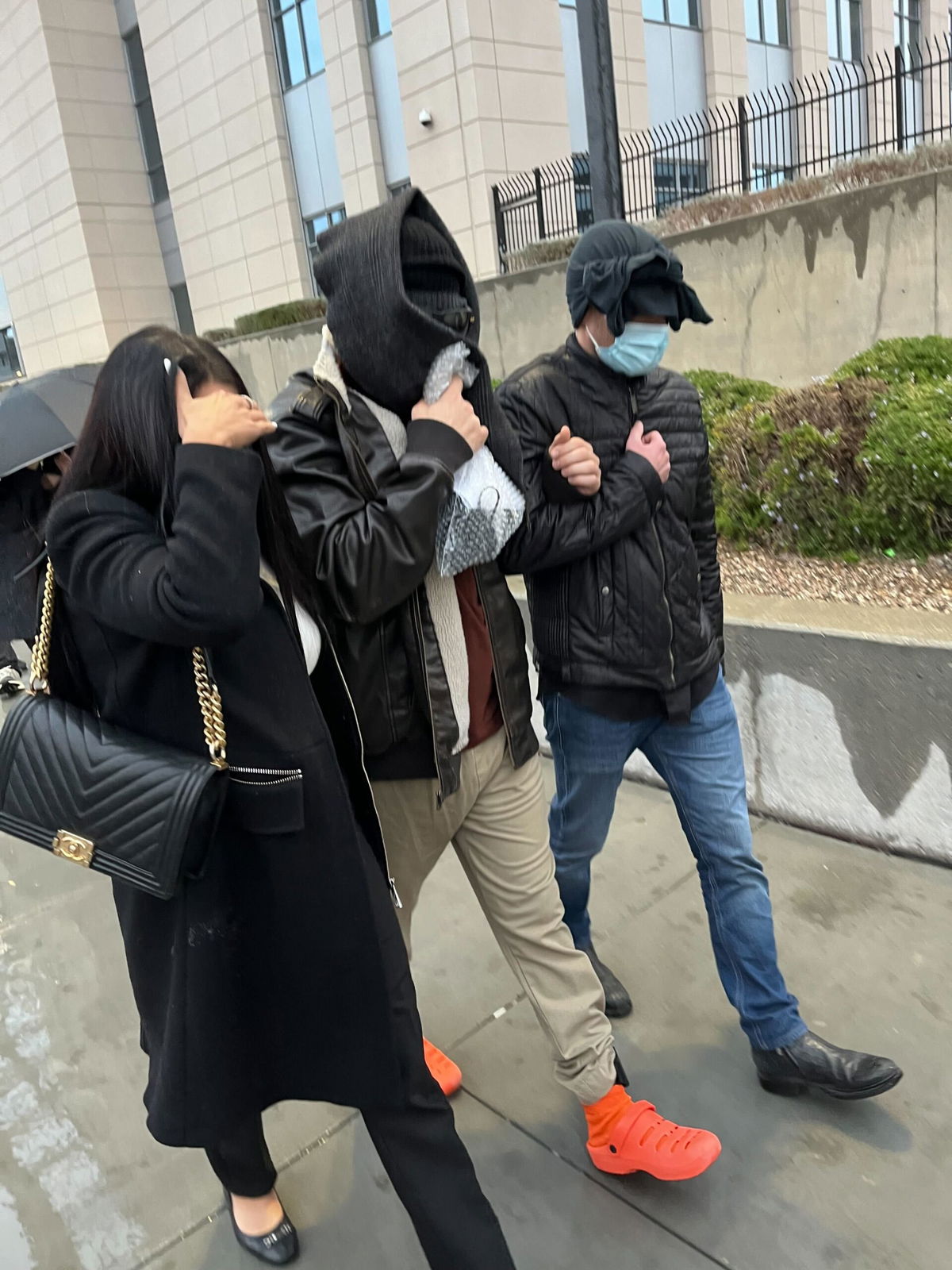 <i>CNN via CNN Newsource</i><br/>Alexander Smirnov (in the middle) leaving court in Las Vegas