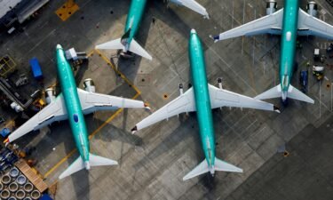 A 2019 aerial photo shows Boeing 737 MAX airplanes parked on the tarmac at the Boeing Factory in Renton