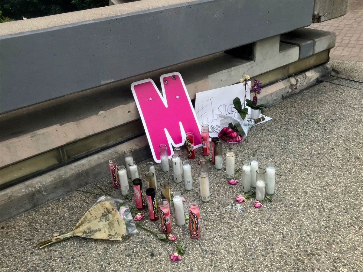 <i>John Antczak/AP via CNN Newsource</i><br/>A street-side memorial for Maleesa Mooney