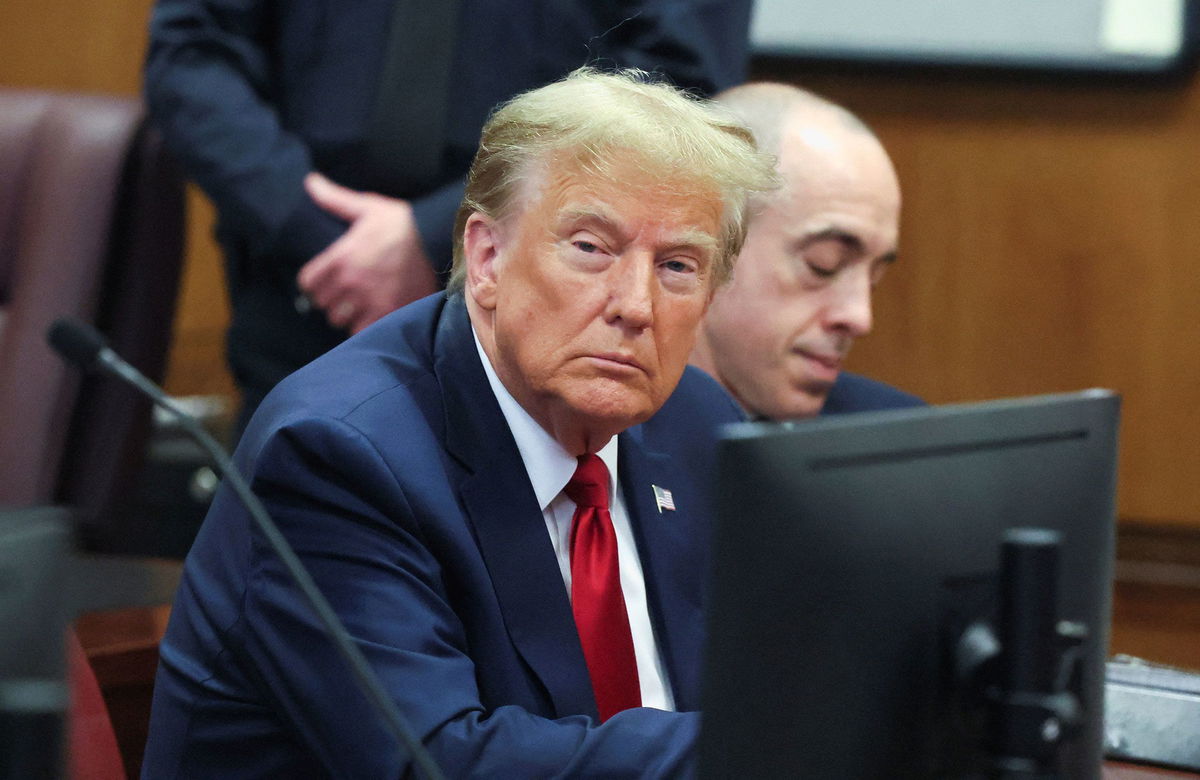 <i>Brendan McDermid/Pool/Reuters via CNN Newsource</i><br/>Former President Donald Trump appears during a court hearing on charges of falsifying business records to cover up a hush money payment to a porn star before the 2016 election