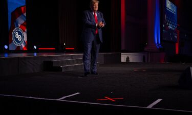 Former President Donald Trump walks on stage during the 2024 NRB International Christian Media Convention Presidential Forum at The Gaylord Opryland Resort and Convention Center on February 22 in Nashville.