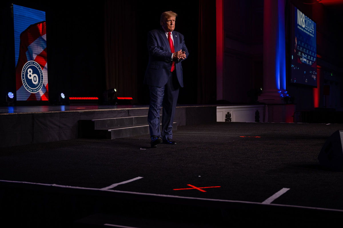 <i>Jon Cherry/Getty Images via CNN Newsource</i><br/>Former President Donald Trump walks on stage during the 2024 NRB International Christian Media Convention Presidential Forum at The Gaylord Opryland Resort and Convention Center on February 22 in Nashville.