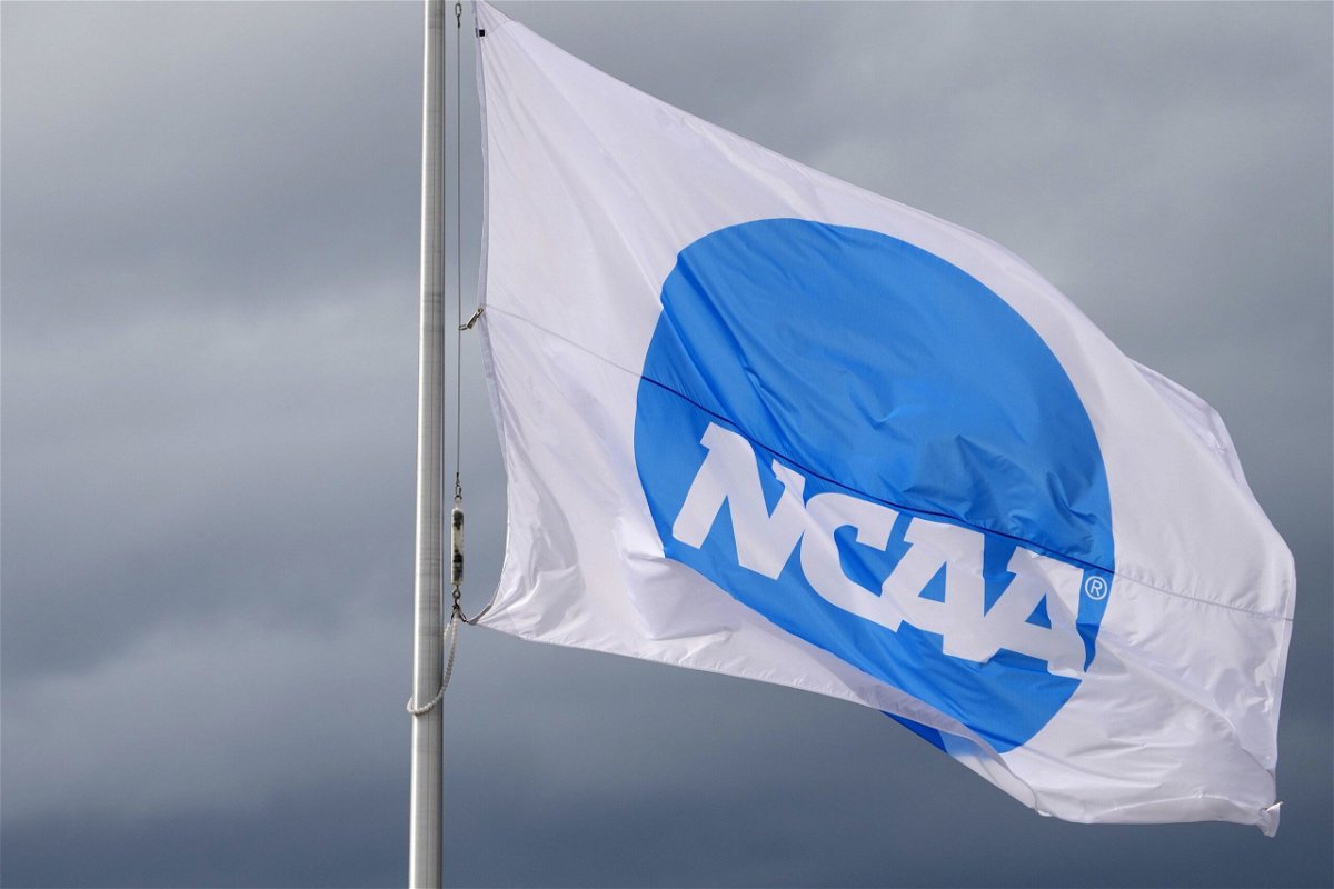 <i>Kirby Lee/USA Today Sports/Reuters via CNN Newsource</i><br/>An NCAA logo flag is seen here in June 2021 at the NCAA Track and Field Championships at Hayward Field. A Tennessee judge has temporarily blocked the NCAA from enforcing parts of its interim policy for student-athletes.