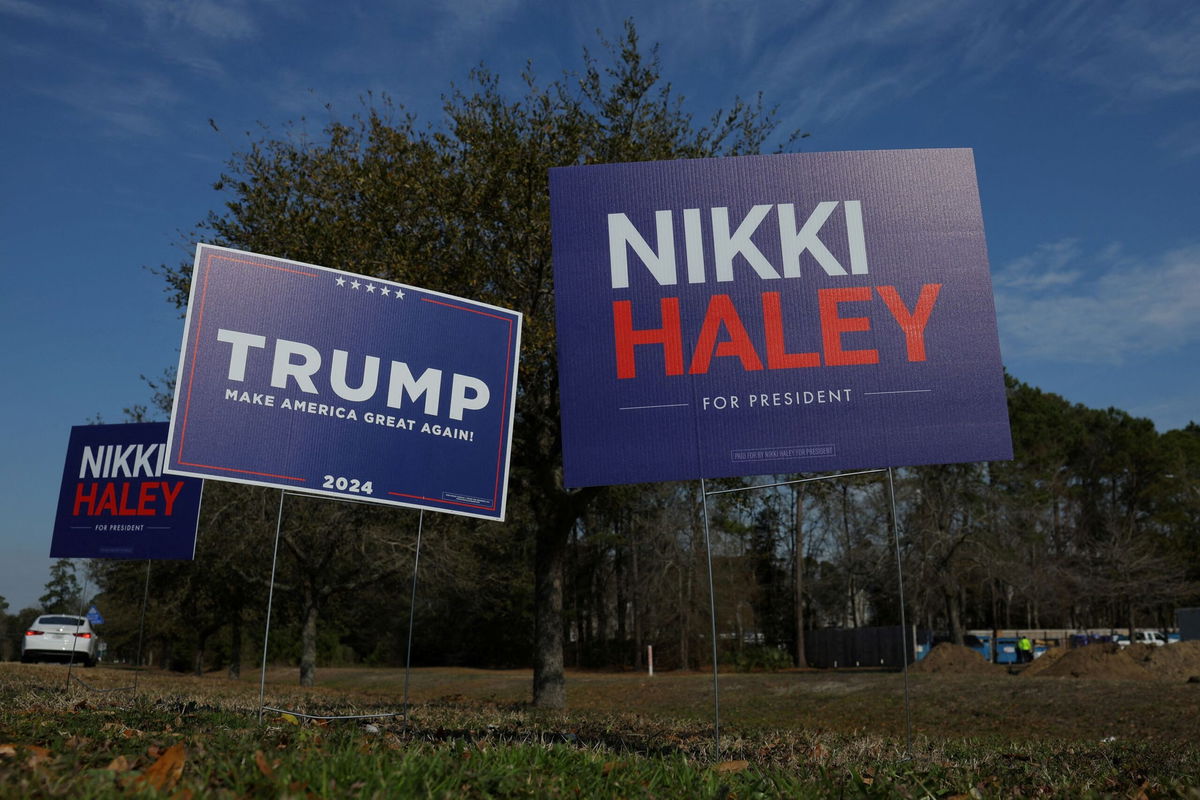 <i>Brian Snyder/Reuters via CNN Newsource</i><br/>Campaign signs for Republican presidential candidates former U.S. Ambassador to the United Nations Nikki Haley and former U.S. President Donald Trump stand along an intersection in Mount Pleasant