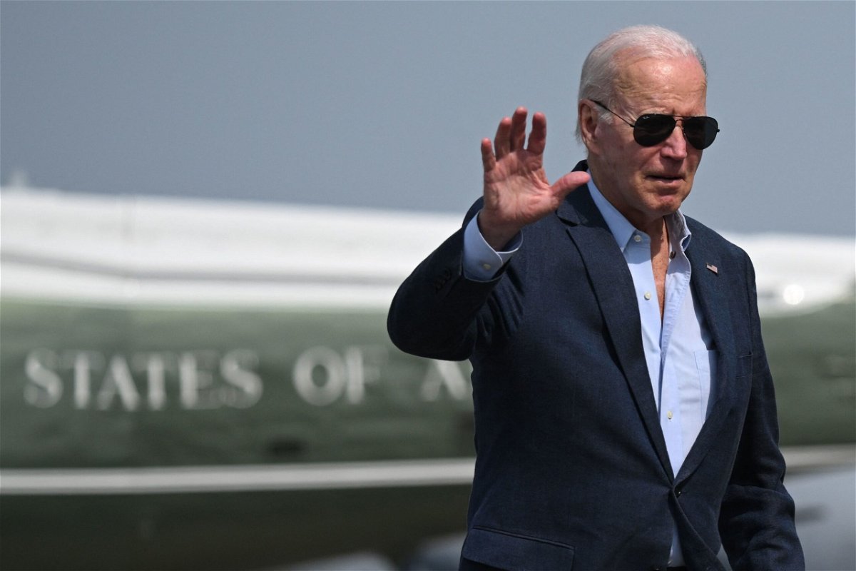 <i>Andrew Caballero-Reynolds/AFP via Getty Images</i><br/>US President Joe Biden waves to the press before boarding Air Force One at Dover Air Force Base in Dover
