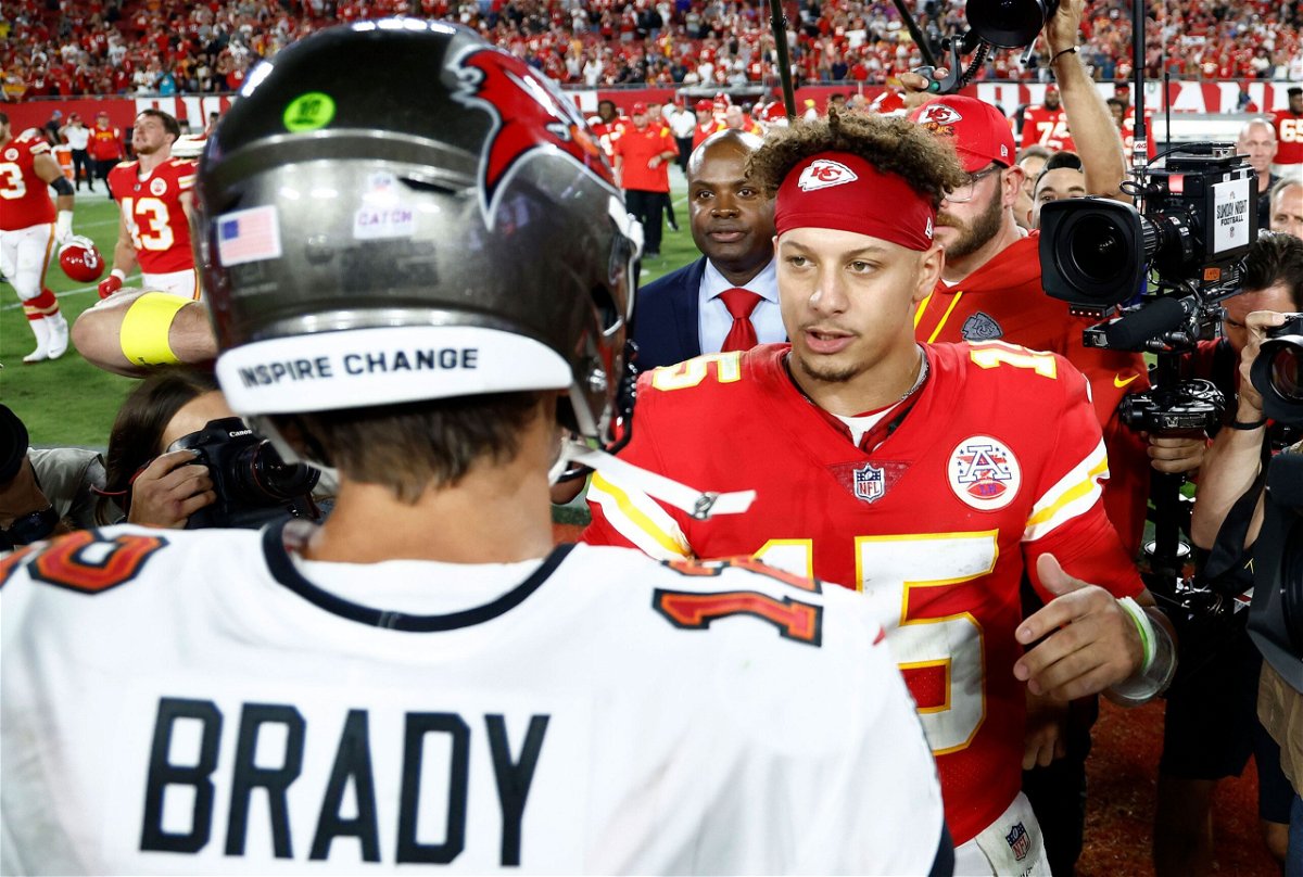 <i>Ed Zurga/AP</i><br/>Mahomes celebrates after throwing a touchdown pass during the first half of the Chiefs' Wild Card playoff victory over the Miami Dolphins.