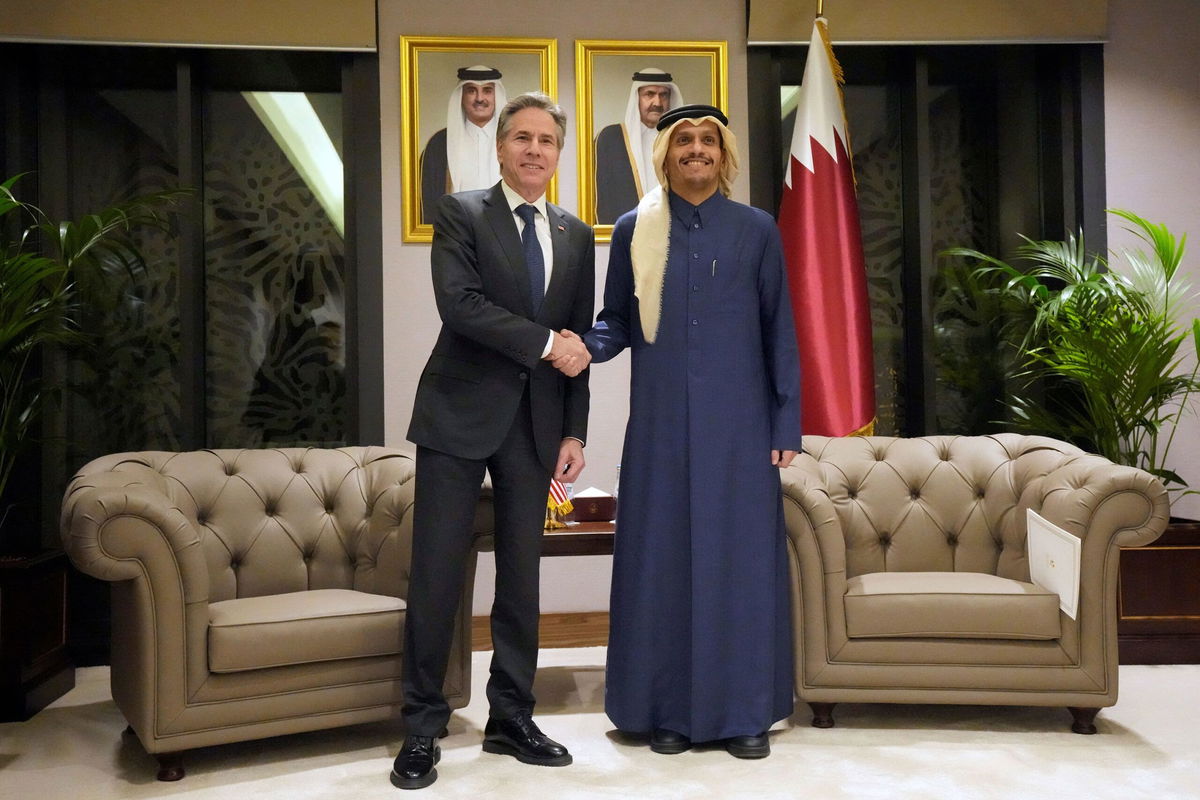 <i>Mark Schiefelbein/Pool via Reuters</i><br/>U.S. Secretary of State Antony Blinken shakes hands with Qatar's Prime Minister and Foreign Affairs Minister Mohammed Bin Abdulrahman Al Thani