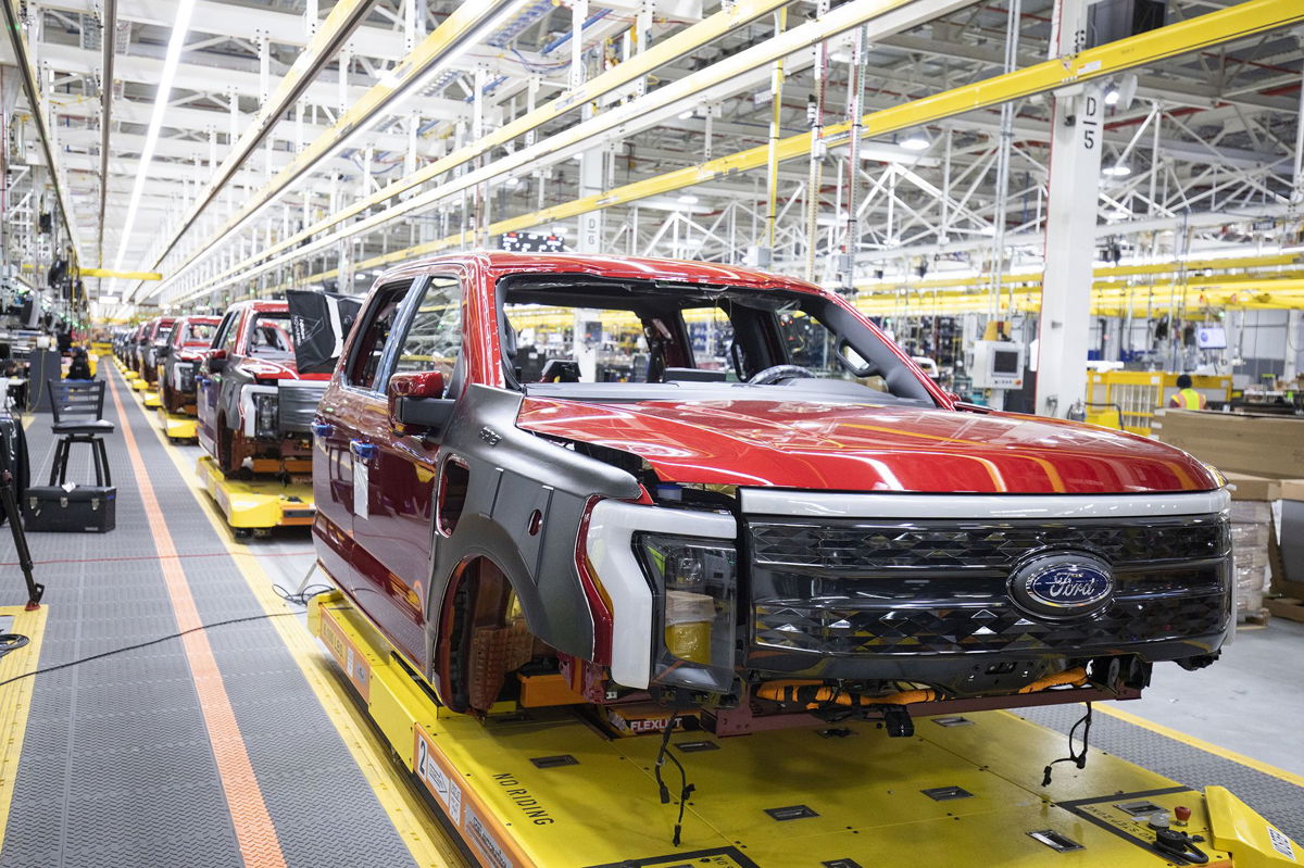 <i>Bill Pugliano/Getty Images</i><br/>Ford F-150 Lightning electric pickup trucks sit on the production line in Dearborn
