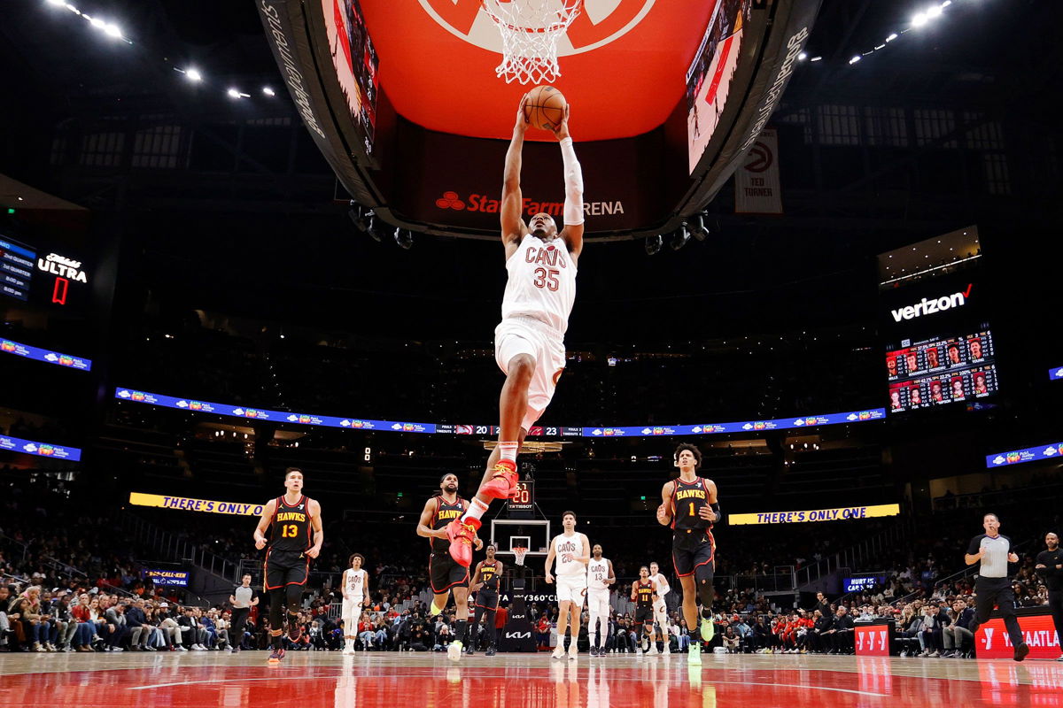 <i>Alex Slitz/Getty Images</i><br/>Tristan Thompson #13 of the Cleveland Cavaliers scores over the Atlanta Hawks during the first half at State Farm Arena on January 20