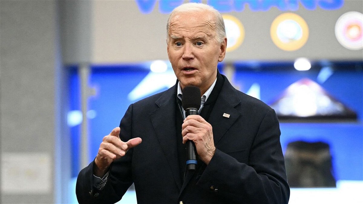 <i>MANDEL NGAN/AFP/AFP via Getty Images</i><br/>US President Joe Biden speaks to members of the United Auto Workers (UAW) at the UAW National Training Center