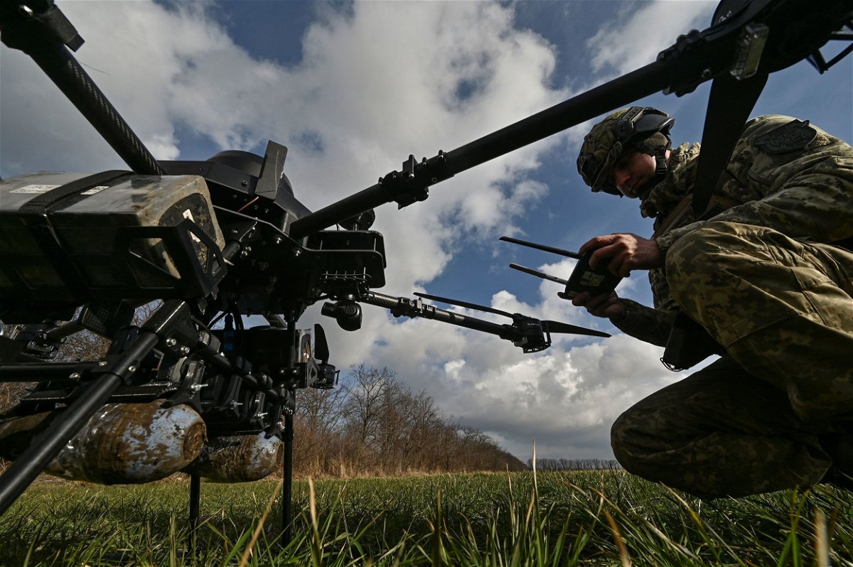<i>Stringer/Reuters</i><br/>A Ukrainian serviceman checks a Vampire unmanned aerial vehicle before flying near a front line