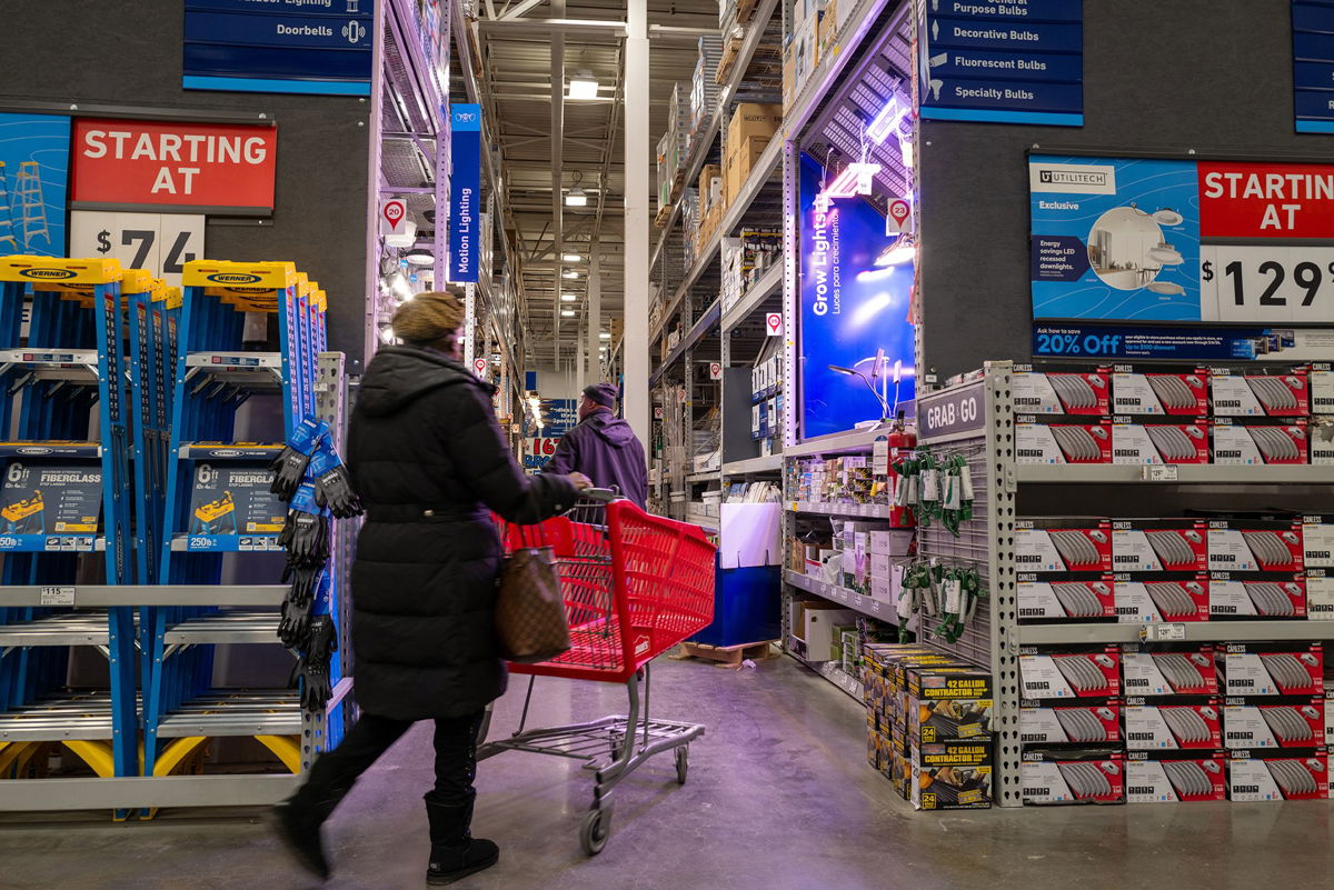<i>Spencer Platt/Getty Images</i><br/>People shop at a home improvement store in Brooklyn on January 25
