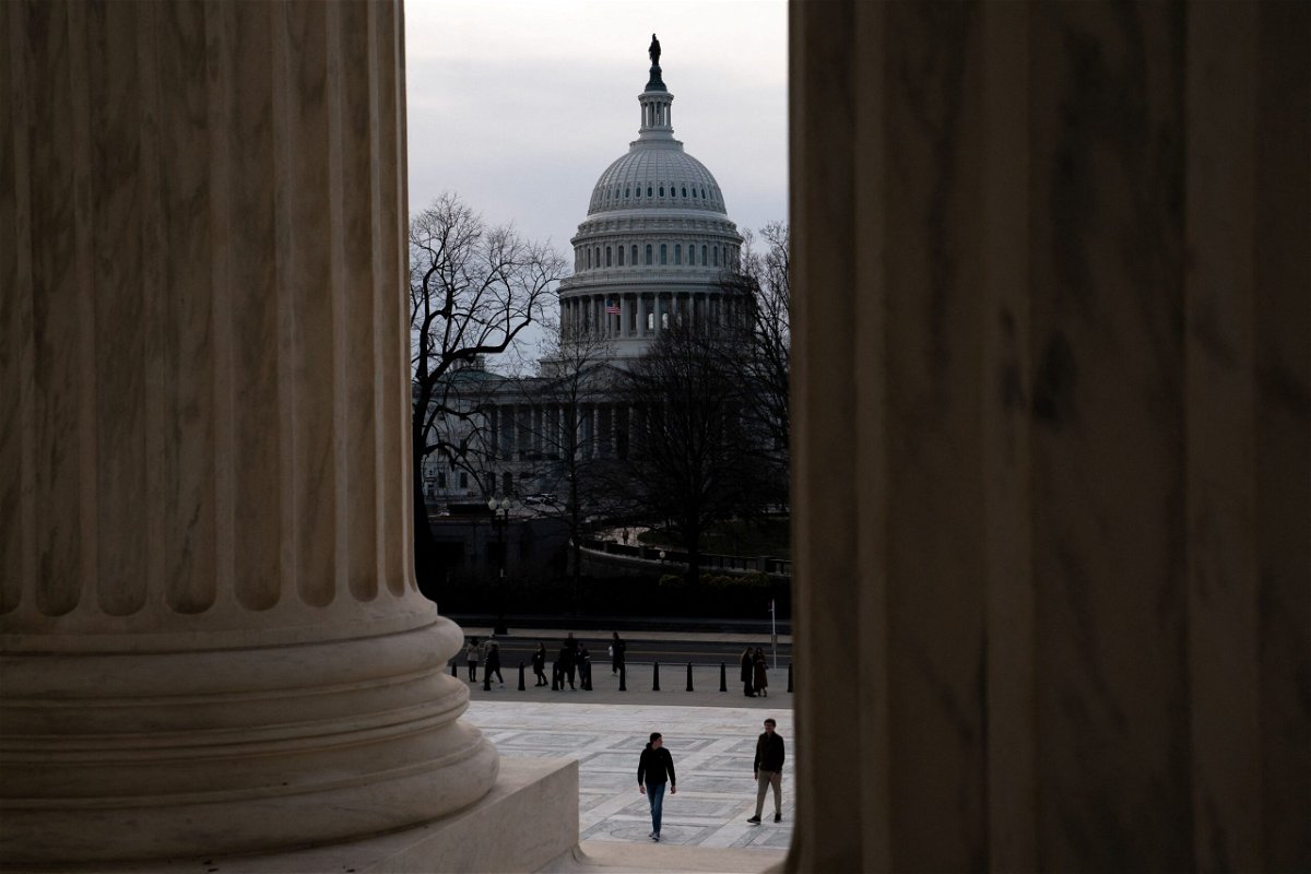 <i>J. Scott Applewhite/AP</i><br/>Senate Majority Leader Chuck Schumer walks to meet reporters at the Capitol in Washington