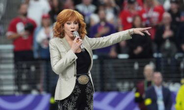 Reba McEntire sings the National Anthem ahead of the Super Bowl at Allegiant Stadium in Las Vegas on Sunday.