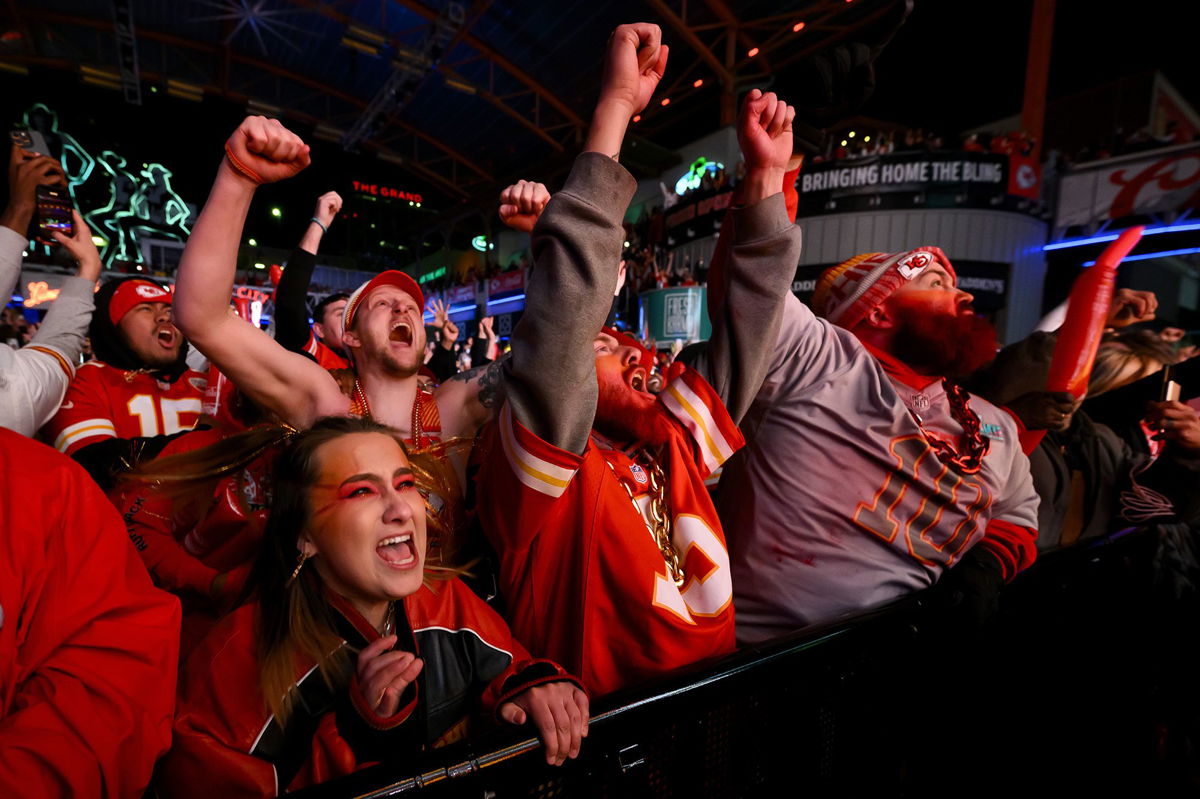 <i>Reed Hoffmann/Getty Images</i><br/>Kansas City Chiefs fans celebrate as their team defeats the San Francisco 49ers in Super Bowl LVIII during the Red Kingdom Block Party at the Power and Light District on February 11