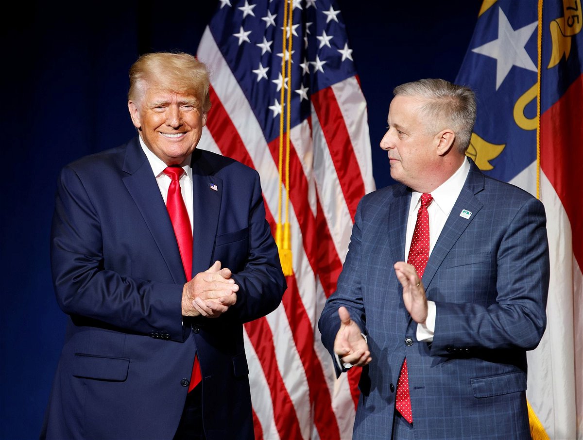 <i>Jonathan Drake/Reuters/File</i><br/>Former President Donald Trump is introduced by North Carolina Republican Party Chairman Michael Whatley before speaking at the North Carolina GOP convention dinner in Greenville
